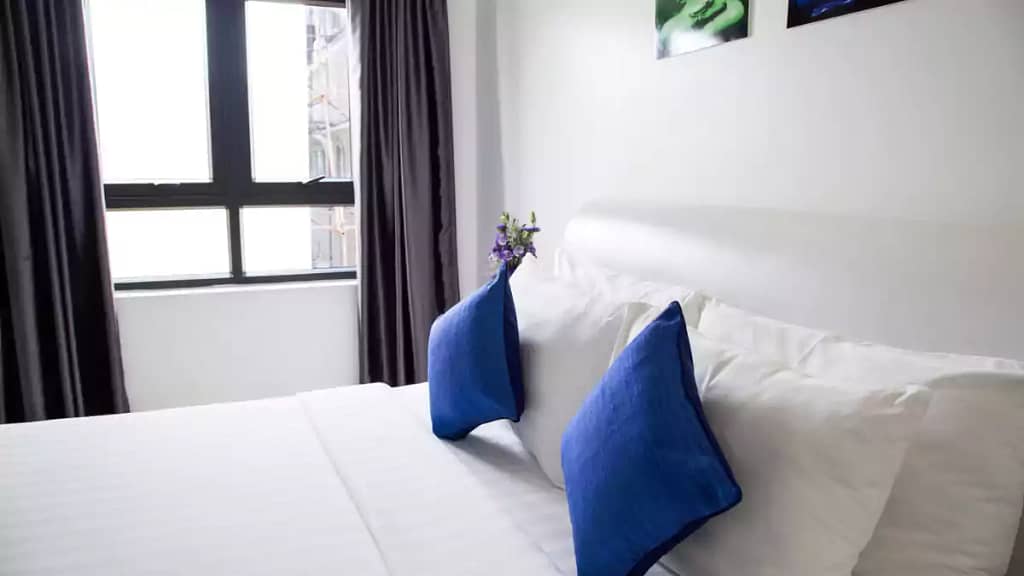 Style up a bed with cushions and throws